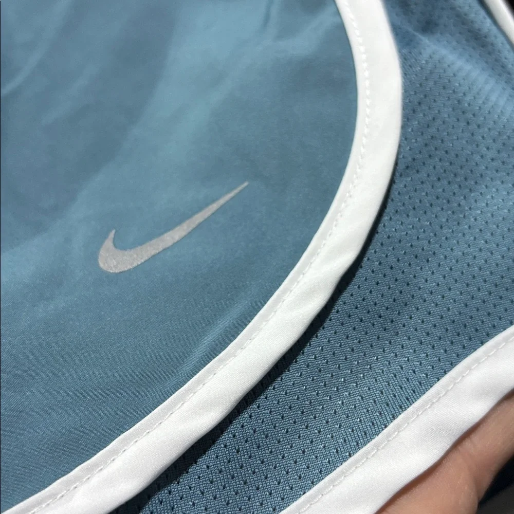 Nike Mid Rise 3” length,panty lined,mesh panel,elastic drawcord waist,running